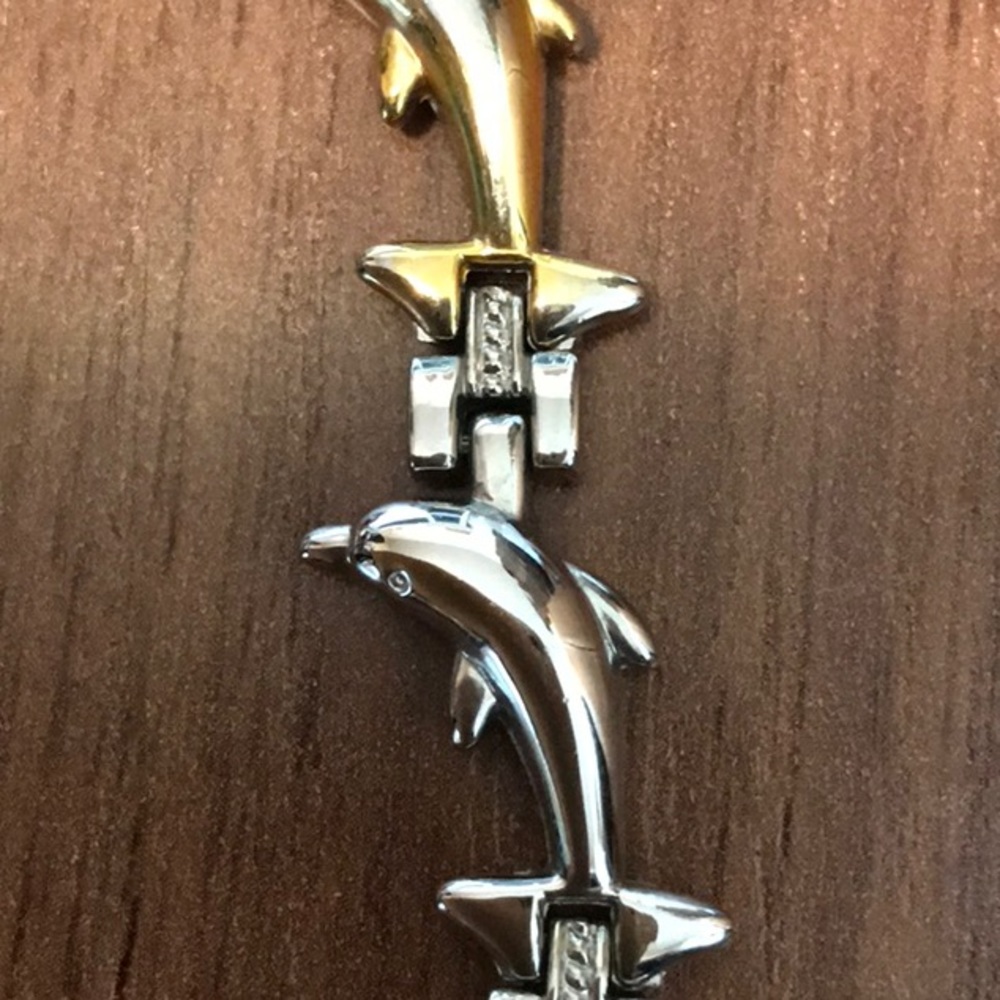 Stainless steel interlocking dolphin bracelet